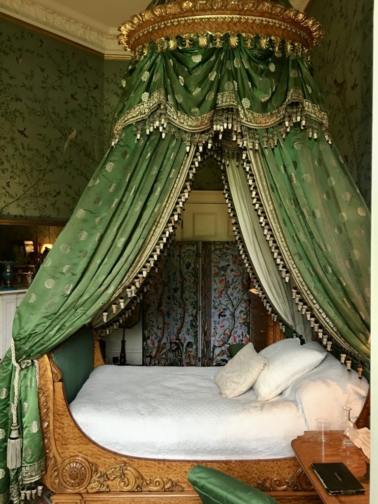 Green guest bedroom bed at Chatsworth 
